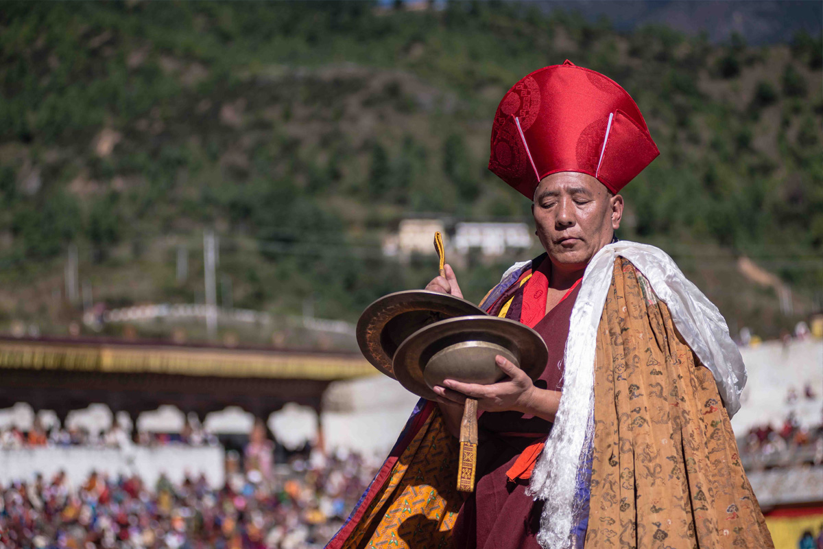 Buddhist Monk performing rituals during Thimphu Tsechu Festival